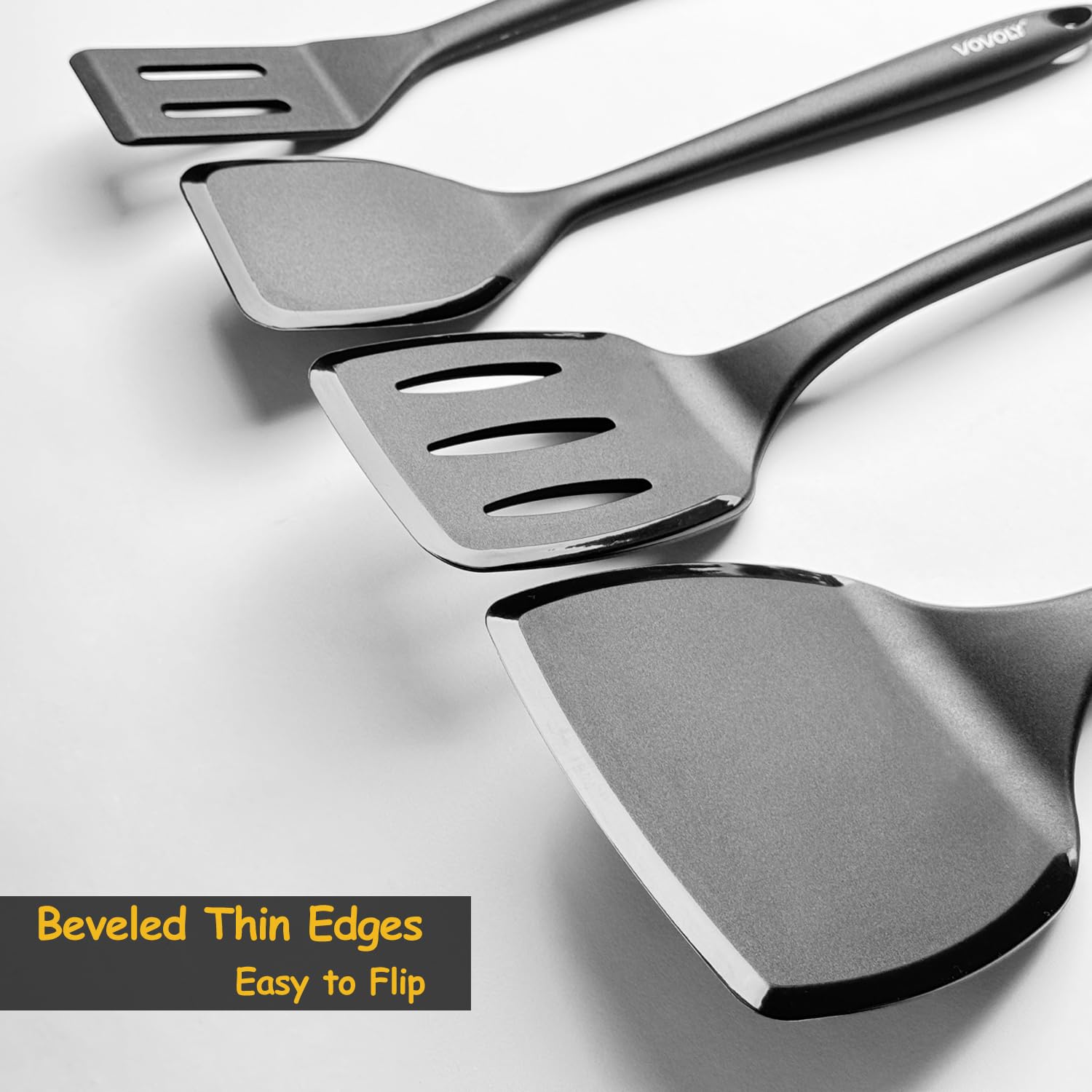 Vovoly slotted spatula draining liquid while lifting omelets and veggies