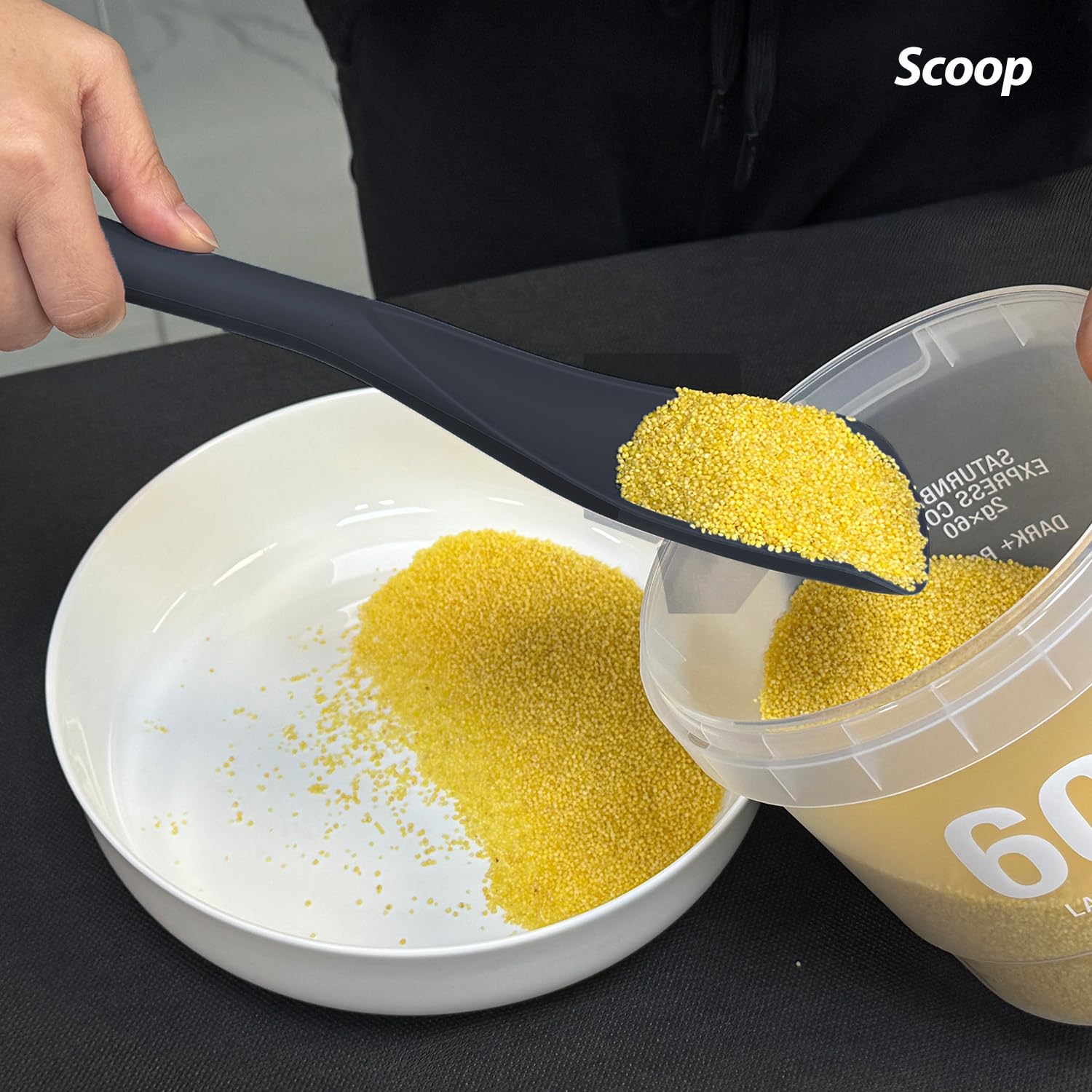 VOVOLY silicone spoon scraping pans without scratching nonstick surfaces.