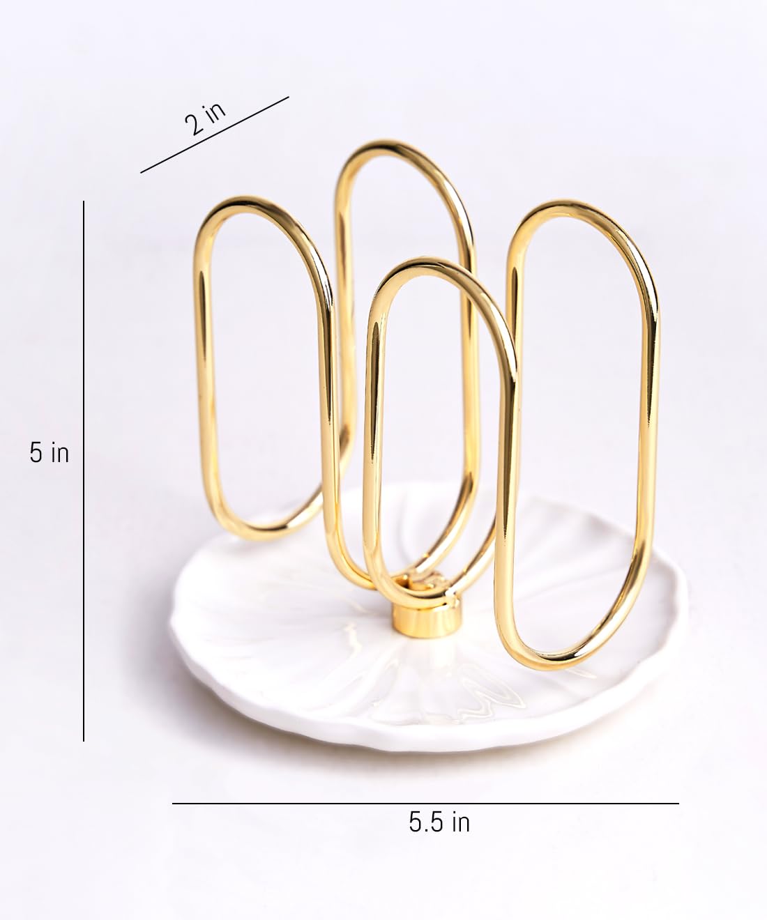 VROOMIUM napkin holder shows 1 lb stability on the table.