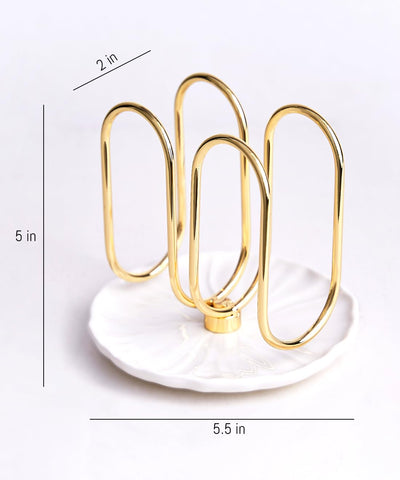 VROOMIUM napkin holder shows 1 lb stability on the table.