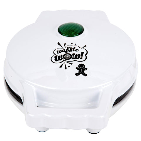 Waffle Wow gingerbread-man mini waffle maker unboxed with recipe guide.