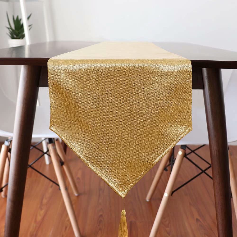 WAITER TREE sparkly gold tassels on a table runner.