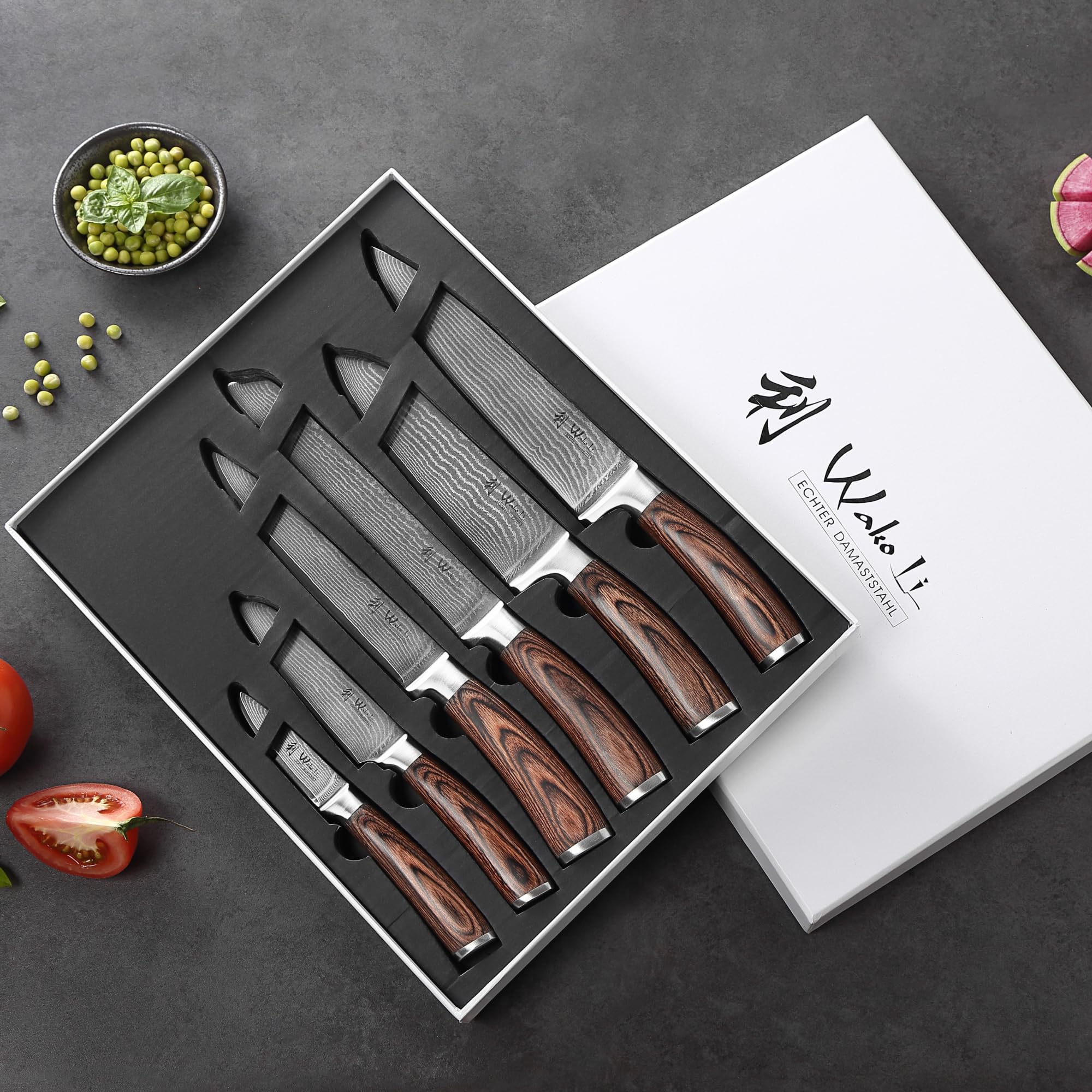 Wakoli EDIB chef knife close-up showing a sharp blade and VG10 core