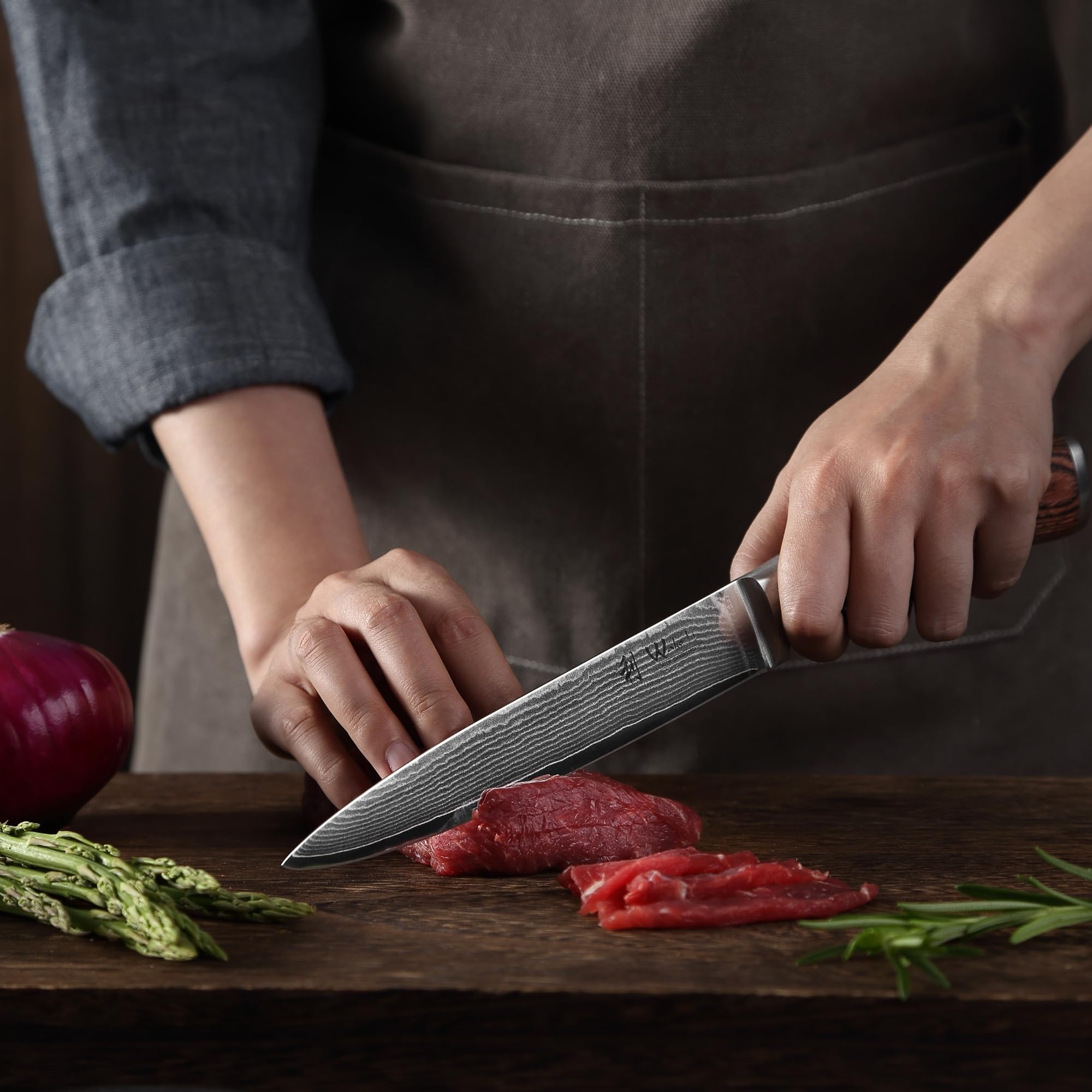 Wakoli EDIB blades showcasing 67-layer Damascus with VG10 core