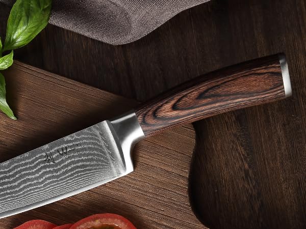 Wakoli EDIB knives in action during kitchen prep and cooking.