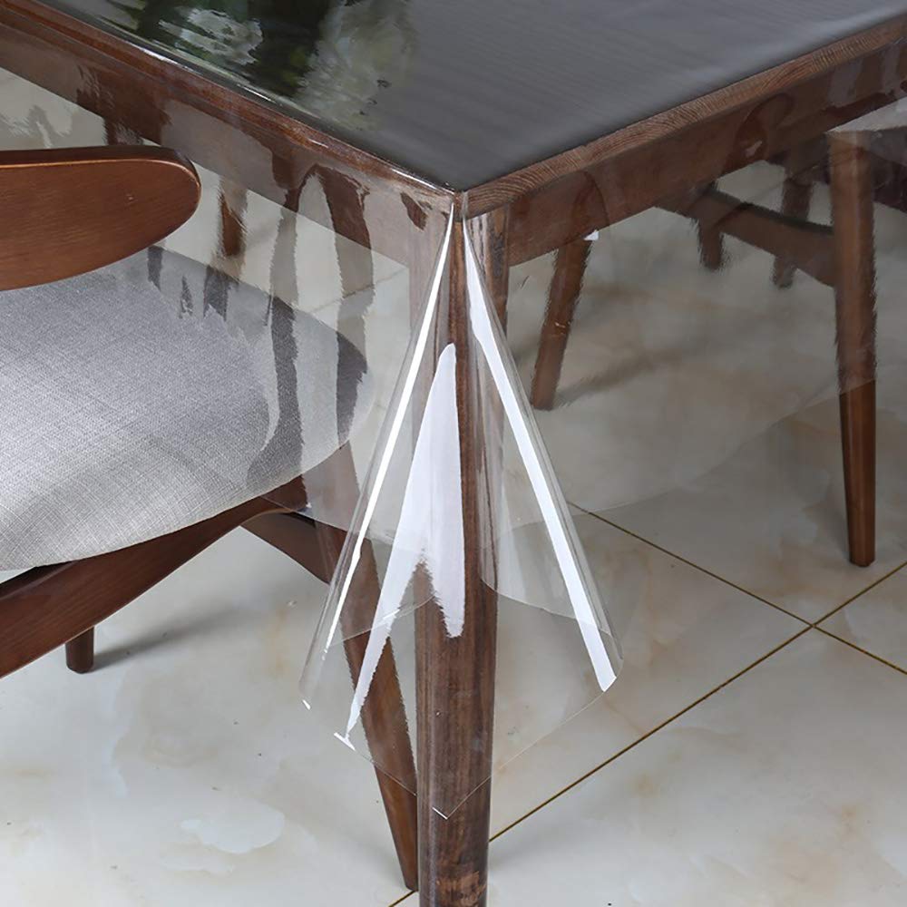 Walrus clear vinyl tablecloth protector on a dining table showing waterproof surface protection