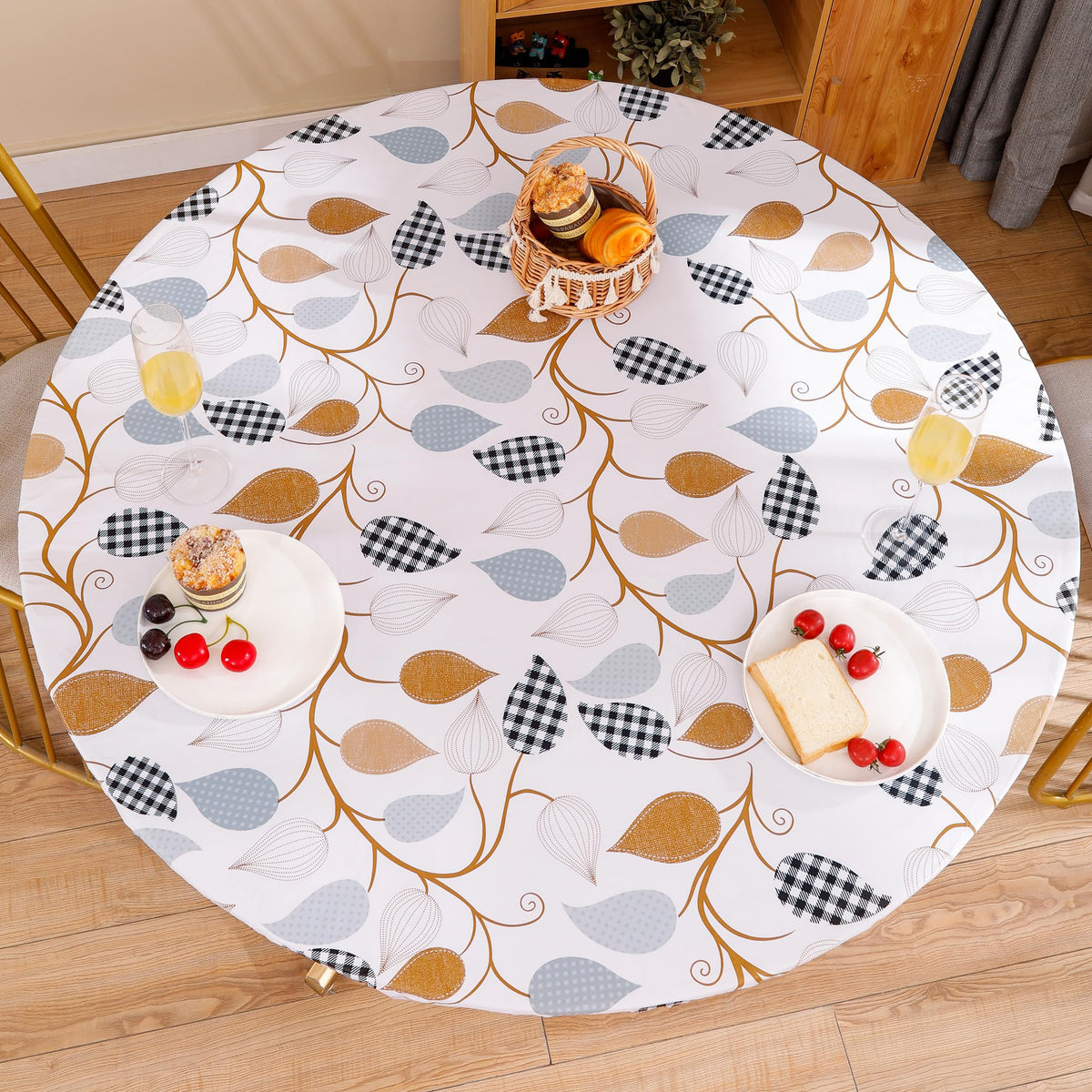 Walrus round vinyl tablecloth with elastic edge secures for a clean, mess-resistant table setting