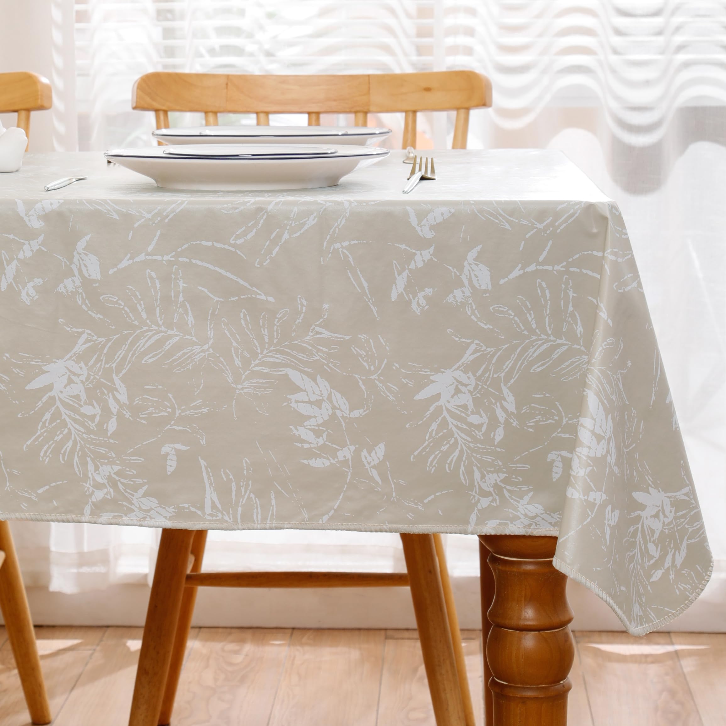 Walrus flannel-backed tablecloth close-up highlighting warm beige plaid texture.
