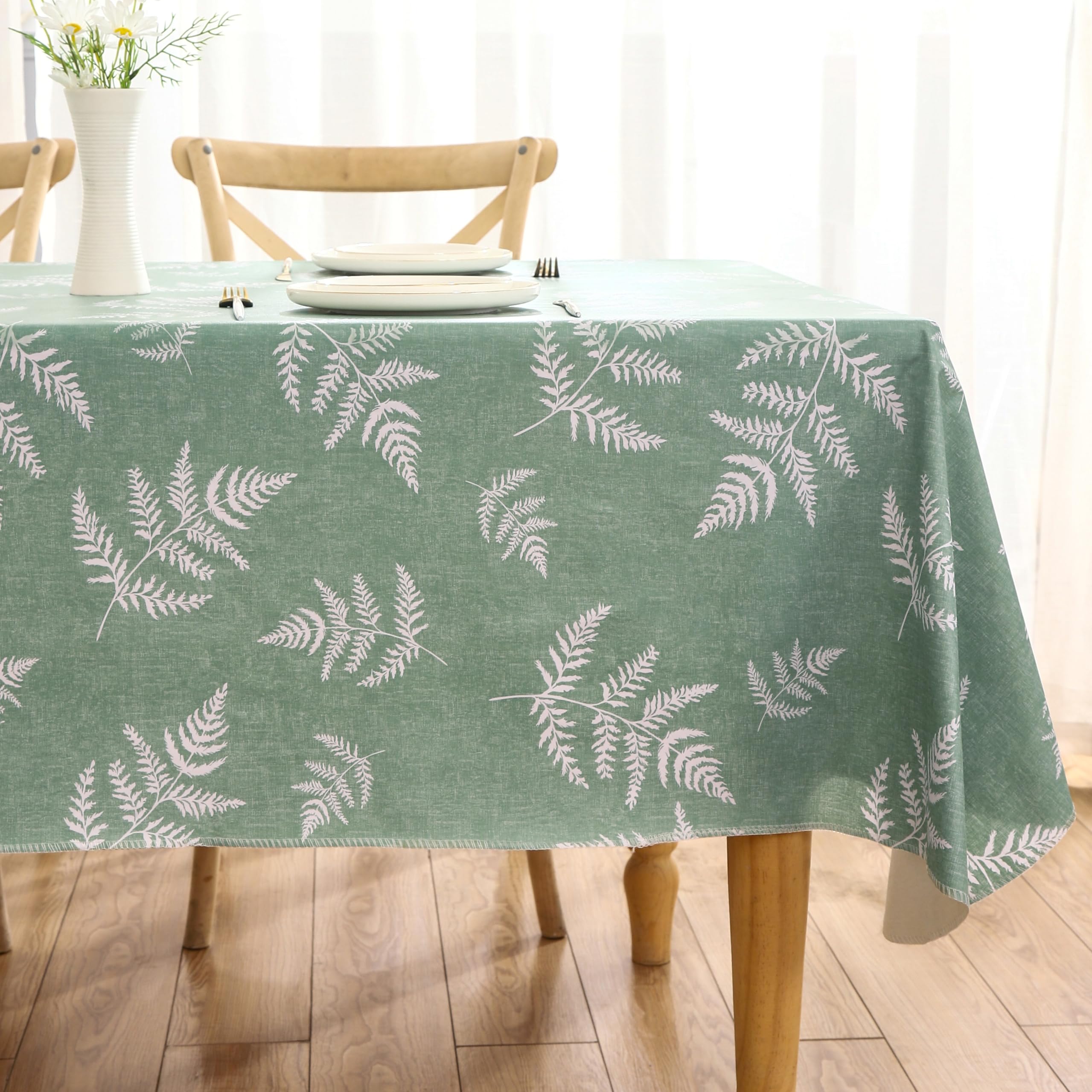 Walrus mint leaf tablecloth on an indoor dining setup.