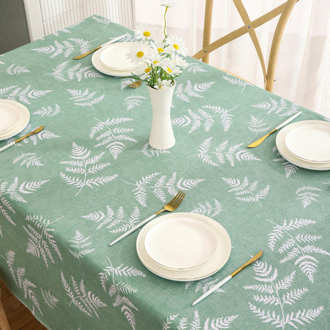 Walrus mint leaf vinyl tablecloth at an outdoor picnic.