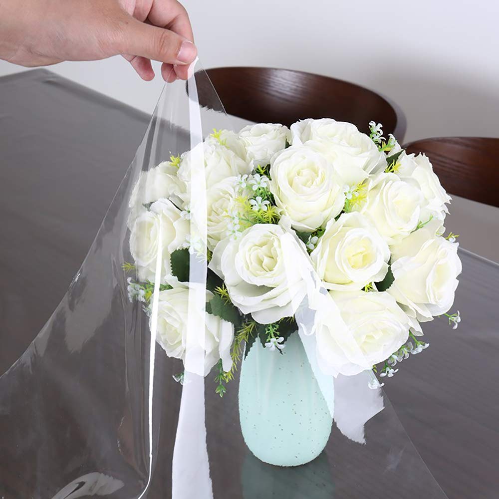 Walrus clear vinyl tablecloth protecting a dining setup with waterproof and oil-proof surface