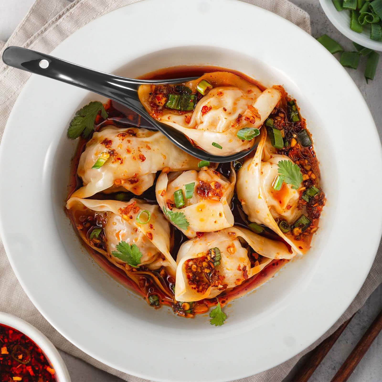 Wareland ramen spoons with right-sized curves cradle broth and noodles