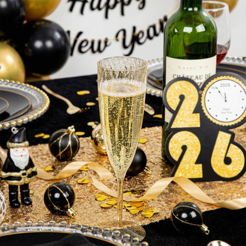 WDF gold glitter detail close-up champagne flutes highlighting sparkling party glamour
