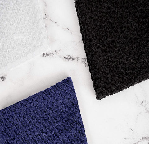 Wealuxe absorbency in action demonstrates fast spill cleanup on counters.