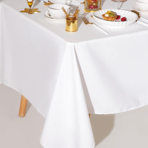 Wedding banquet setup featuring Wealuxe 85x85 white tablecloths.