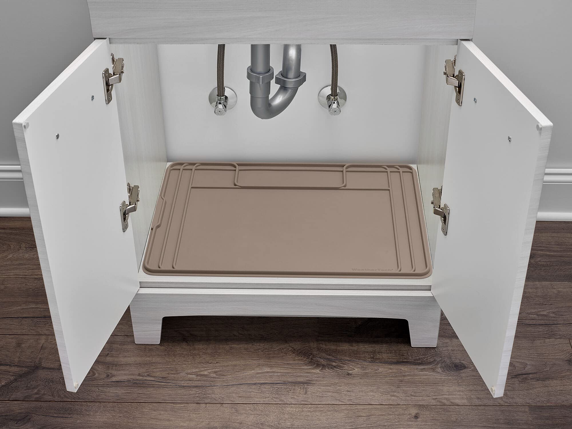 WeatherTech SinkMat under-sink coverage protects cabinets in kitchens and bathrooms.