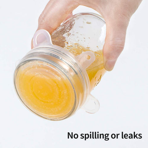 Webake wide-mouth lid stretched over jars, secure seal and easy reuse.