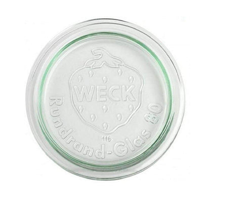 WECK 100mm lid close-up showing glass edge and clamp-ready design for compatible jars.