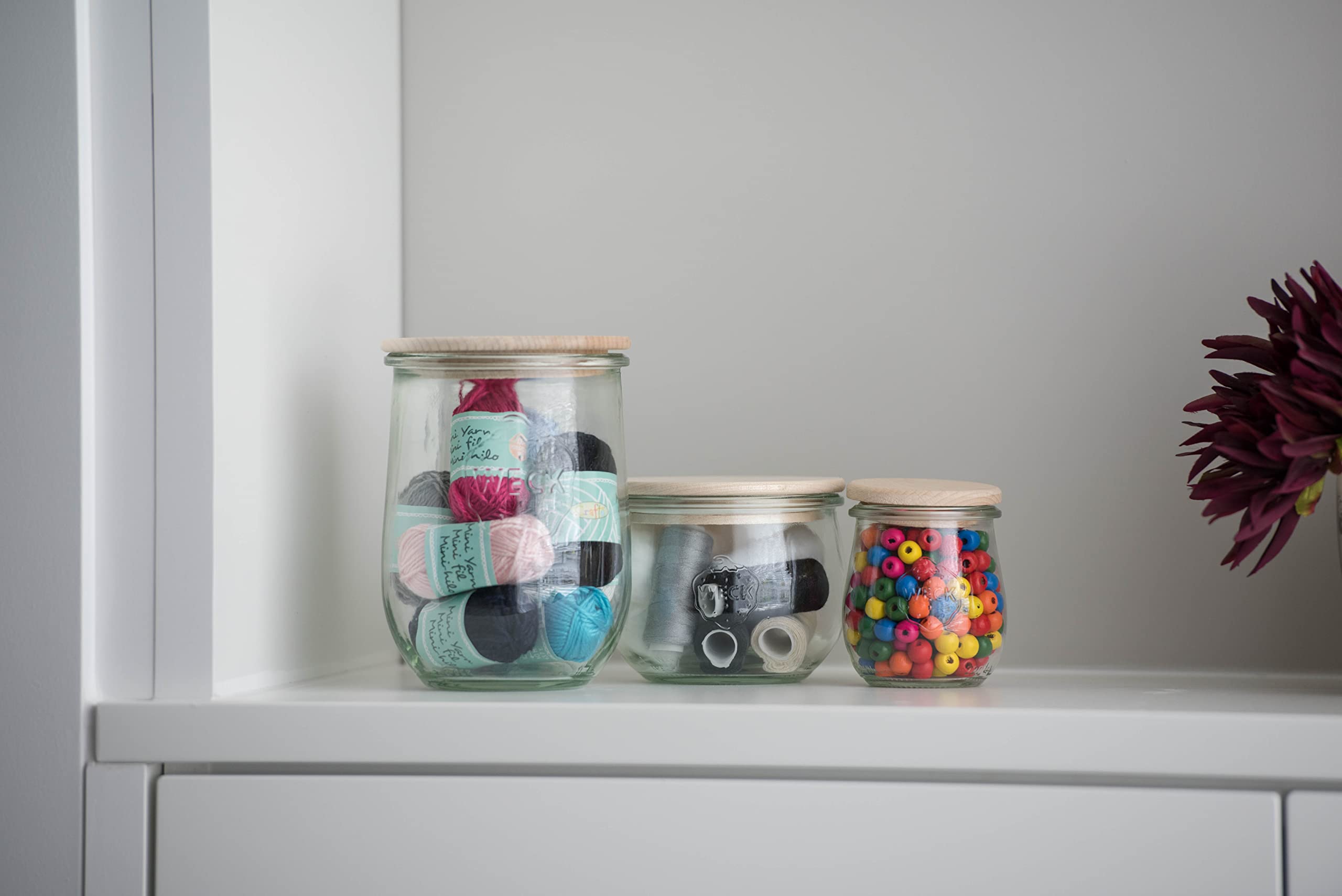 WECK 745 jar with wooden lid in herb display, decorative and functional.