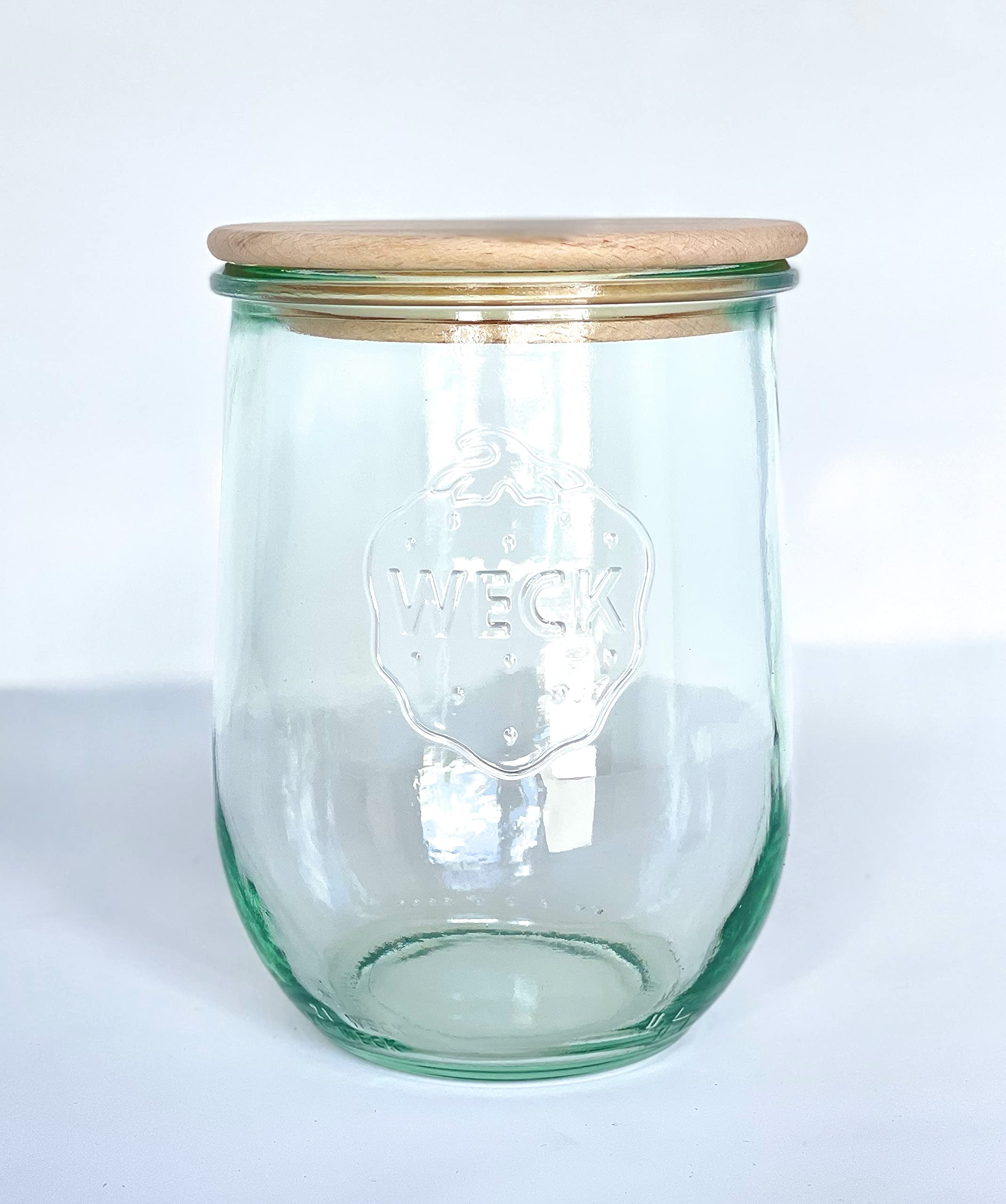 WECK 745 tulip jars lined up demonstrate stackable, space-saving organization.