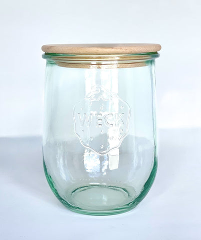 WECK 745 tulip jars lined up demonstrate stackable, space-saving organization.