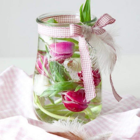 Weck Tulip Jars sturdy glass body emphasized in clear finish.