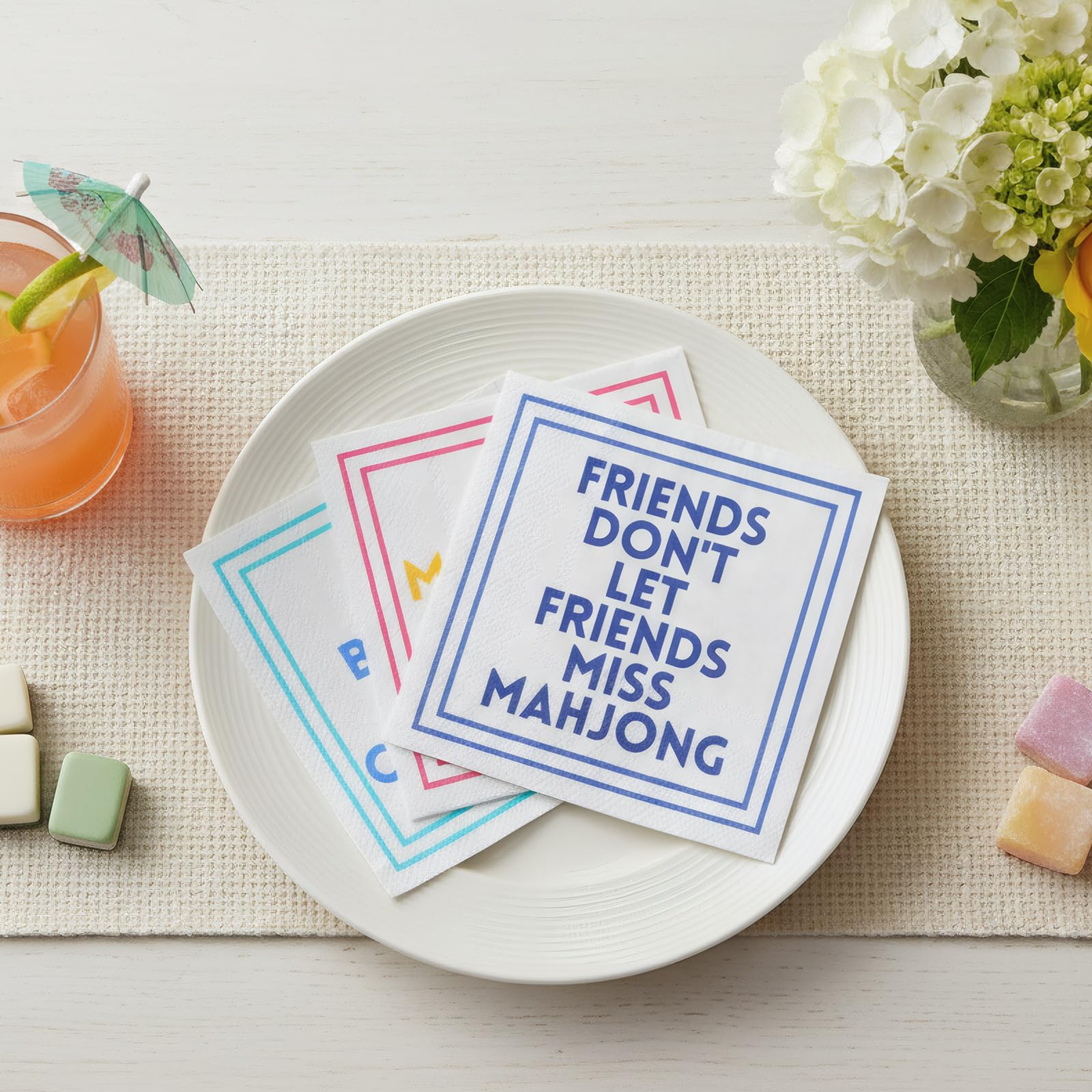 Weekgrat Mahjong napkins folded to 5x5 inches for drinks and bites.