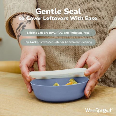 WeeSprout bamboo kids bowls with lids in orange for self-feeding support.