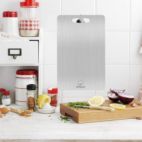 Wekayli portable steel board ideal for outdoor cooking and camping.