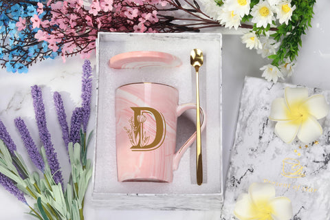 WENSSY pink mug top view highlighting floral motif and initial D.