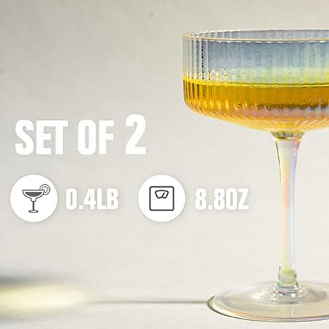 whatAmug home bar ideas showcasing ribbed coupe glasses.
