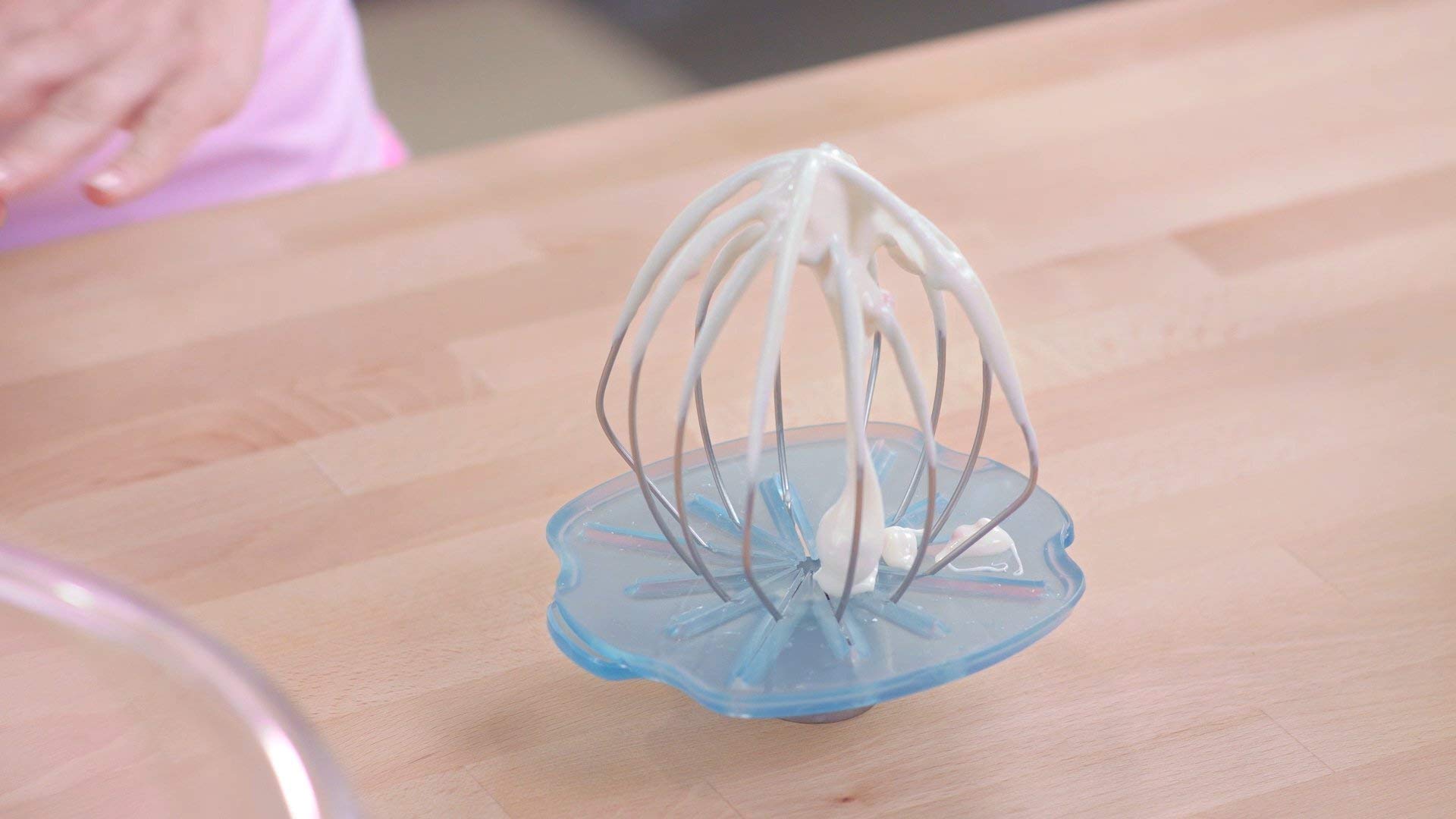 Whisk Wiper PRO hugs the bowl to wipe batter evenly