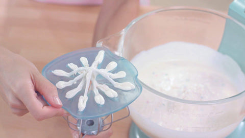 WHISK WIPER PRO on counter catching drips helps keep workspace tidy.