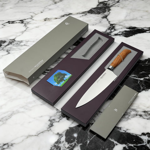 WICKWILLOW 8-inch chef knife in use for slicing onions and portioning meat.