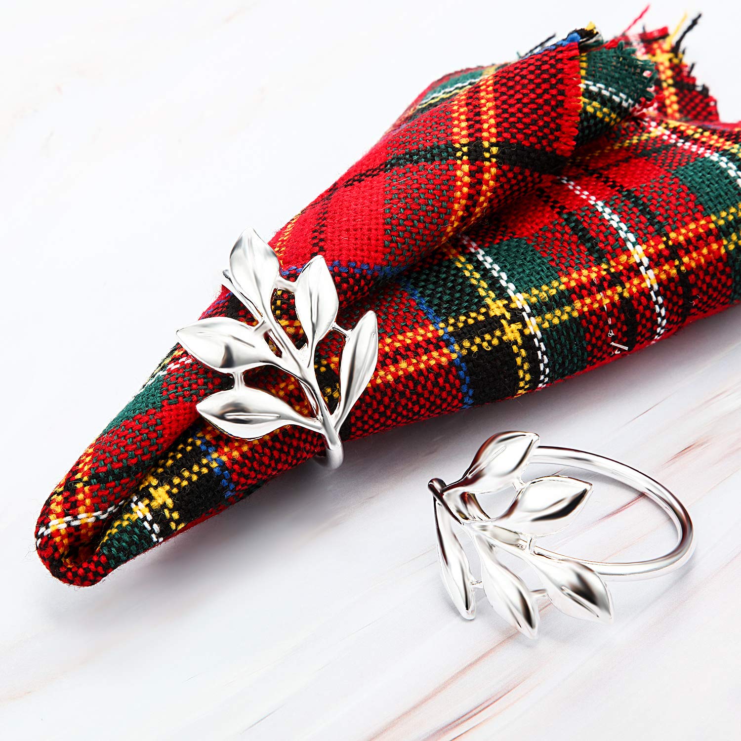 Leaf motif enhances chic wedding or celebration table settings.
