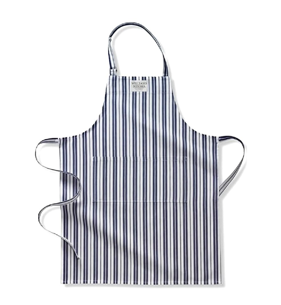 Williams-Sonoma Classic Apron Navy protects clothing during cooking with durable cotton and roomy pockets.
