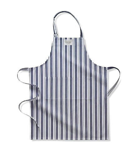 Williams-Sonoma Classic Apron Navy protects clothing during cooking with durable cotton and roomy pockets.