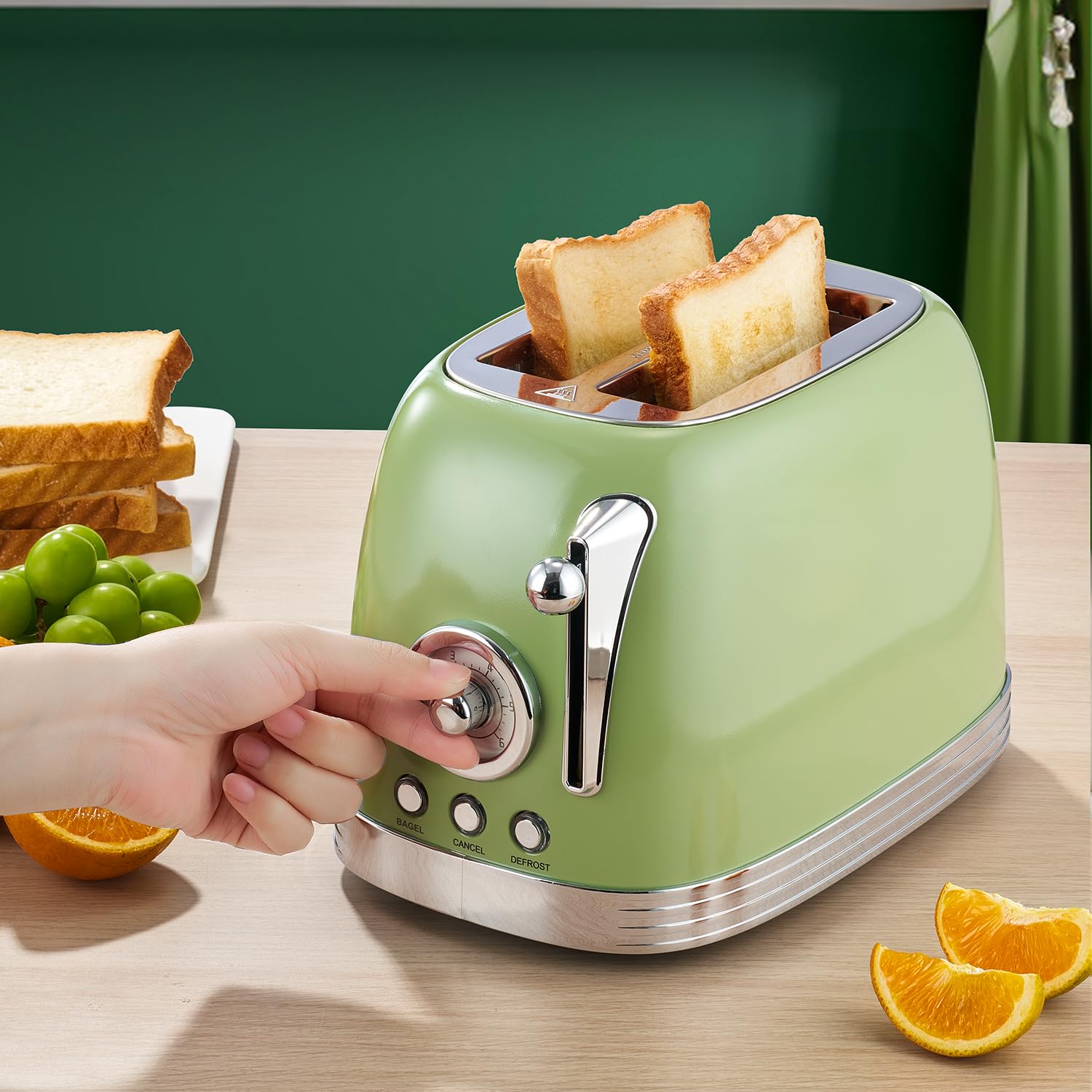 Wiltal Green Retro Toaster removable crumb tray for quick cleaning.