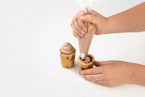 Wilton cookie shot glass pan doubles as chocolate cup mold for desserts.