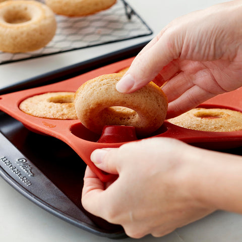 Donut pans in the oven at up to 375 degrees Fahrenheit