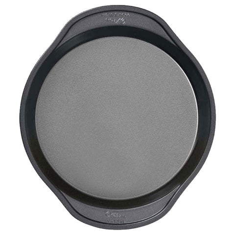 Wilton Gold round cake pan, oven-safe up to 450°F, ideal for versatile baking sessions.