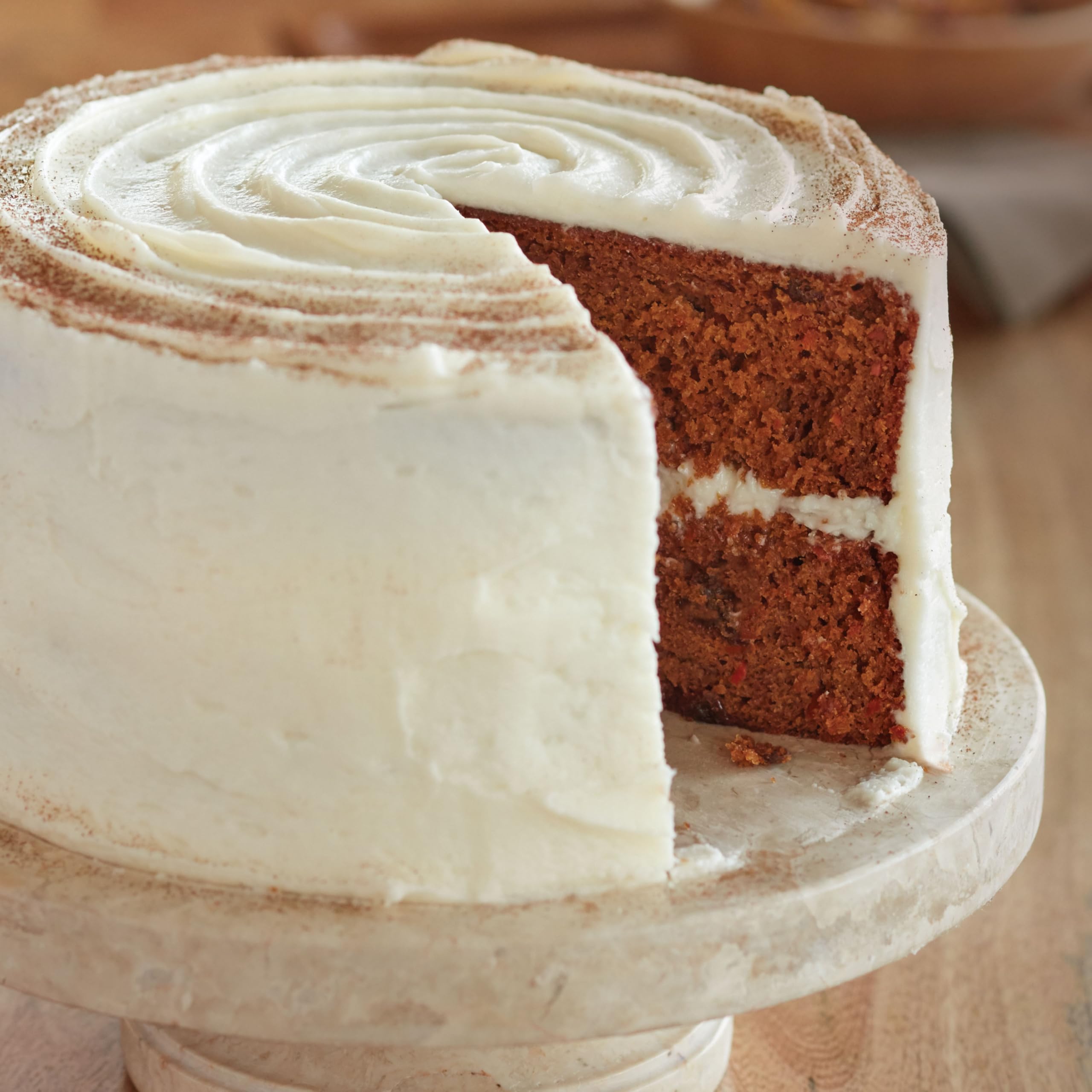 Wilton Gold round cake pan with warp-resistant durability and scratch-resistant surface for lasting use.