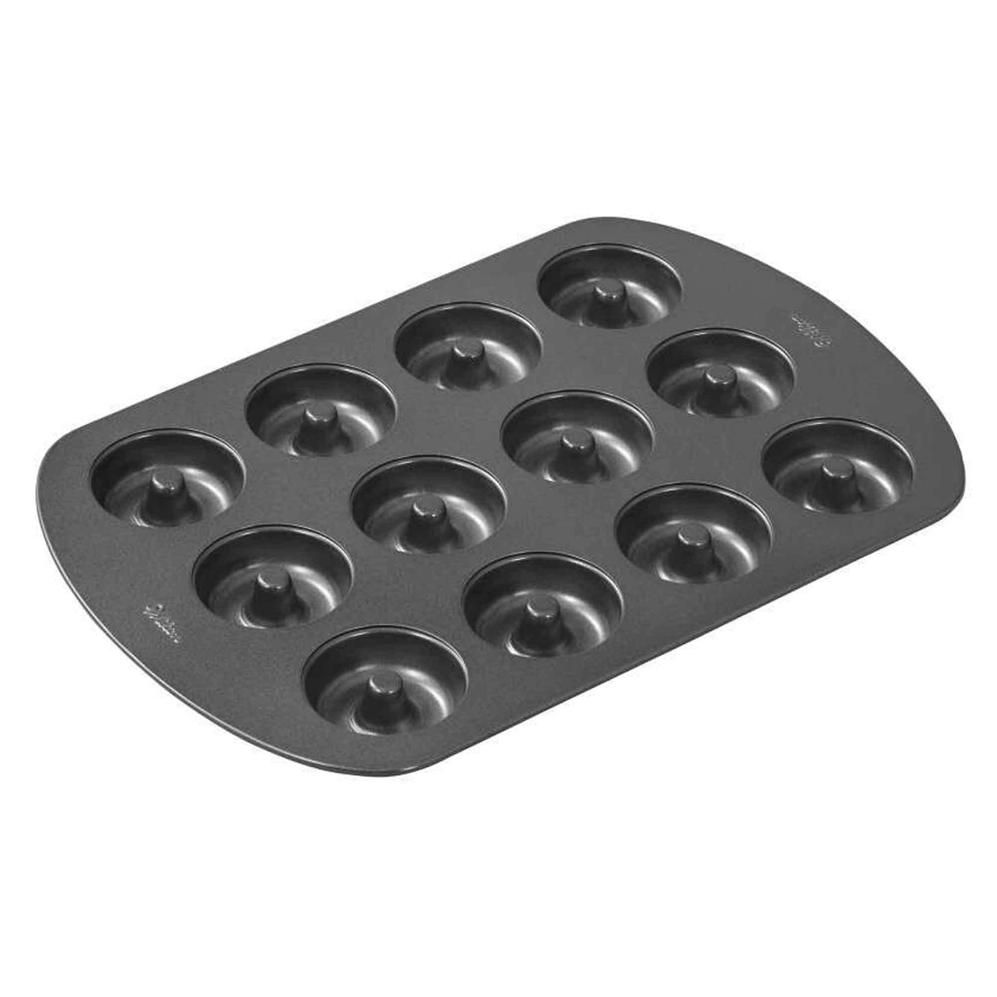 Wilton Mini Donut Pan 12-Cavity with non-stick surface enables easy donut release.