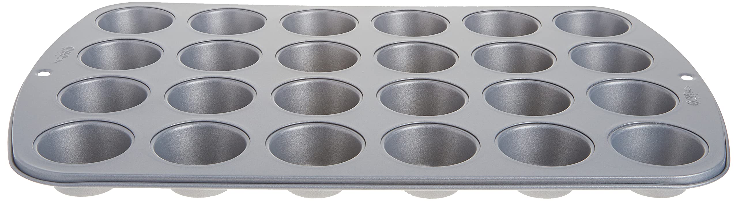 Wilton mini muffin pan showing heavy-gauge construction for durable browning.
