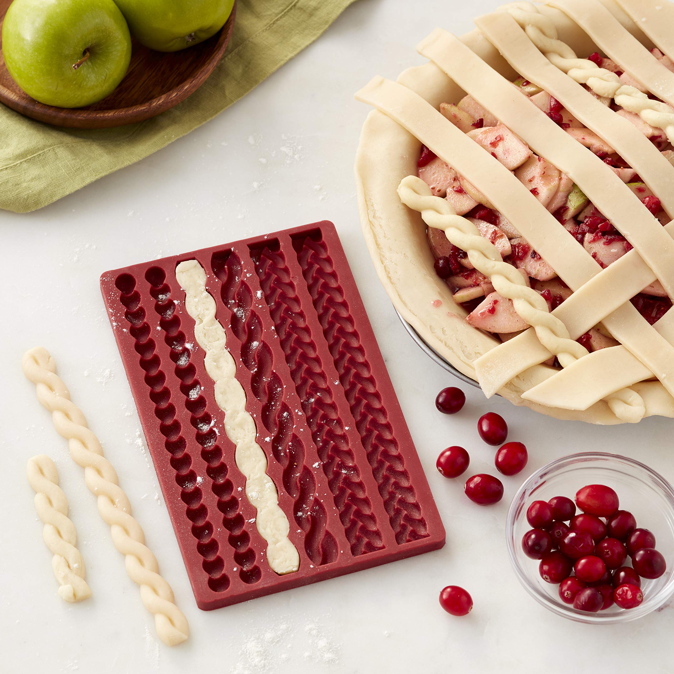 Wilton six-cavity pie mold setup showcasing rope textures for unique baked designs
