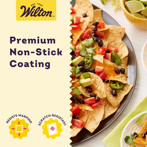 Wilton pizza pan shown as dishwasher-safe for easy cleaning after baking