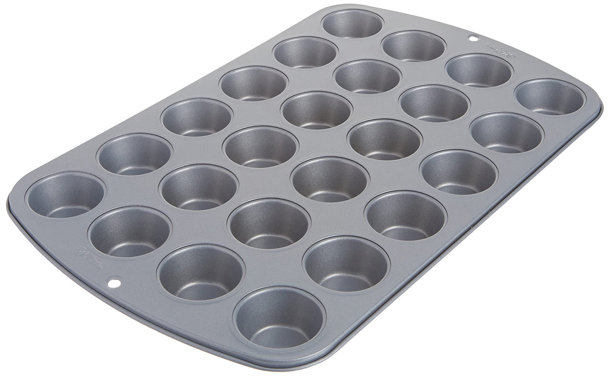 Wilton Recipe Right 24-cup mini muffin pan for even baking and easy release.