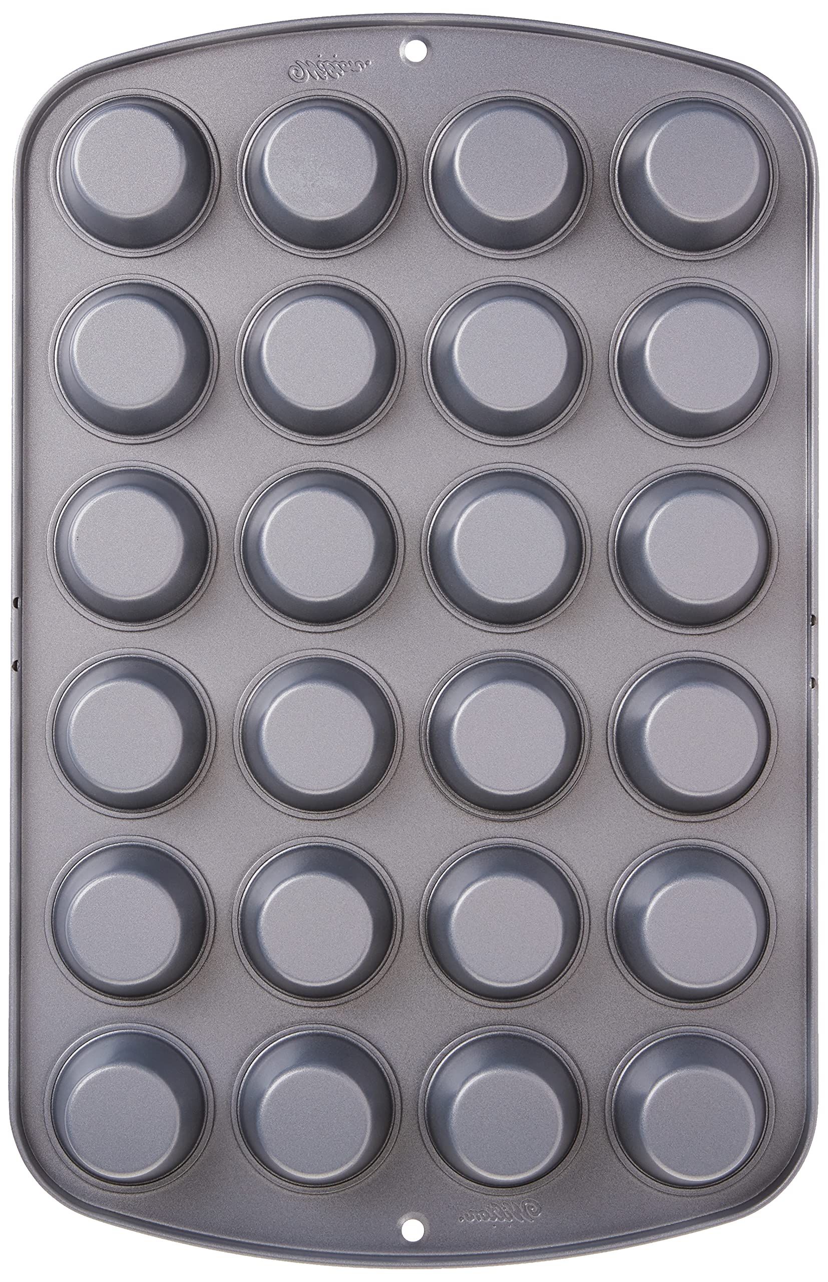 Wilton Recipe Right pan with dimensions embossed on handles for reference.