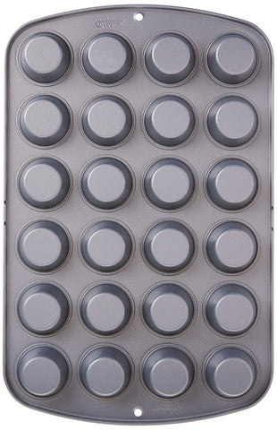 Wilton Recipe Right pan with dimensions embossed on handles for reference.