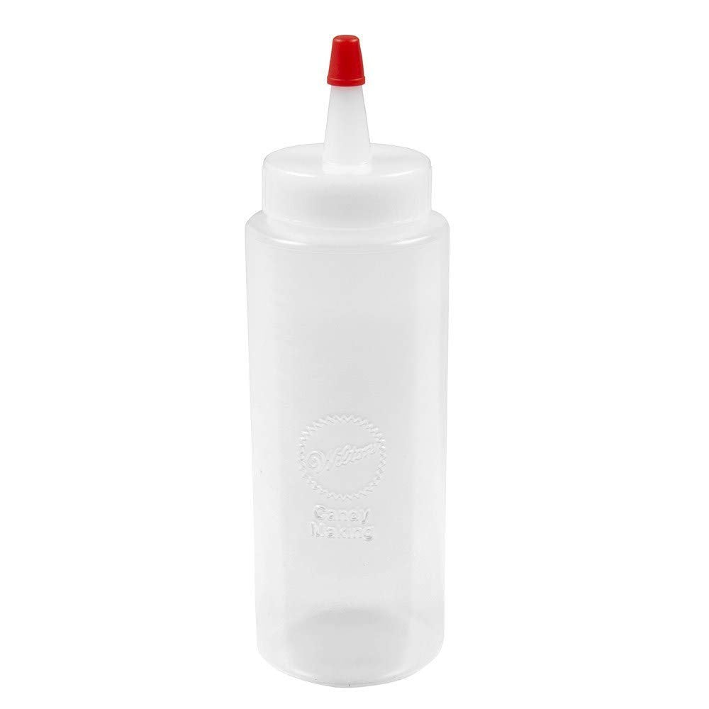 Wilton Regular Melting Squeeze Bottle in use for precise candy piping.